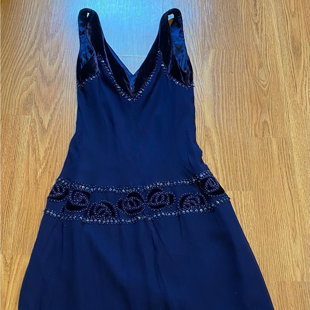 Navy dress with some details.